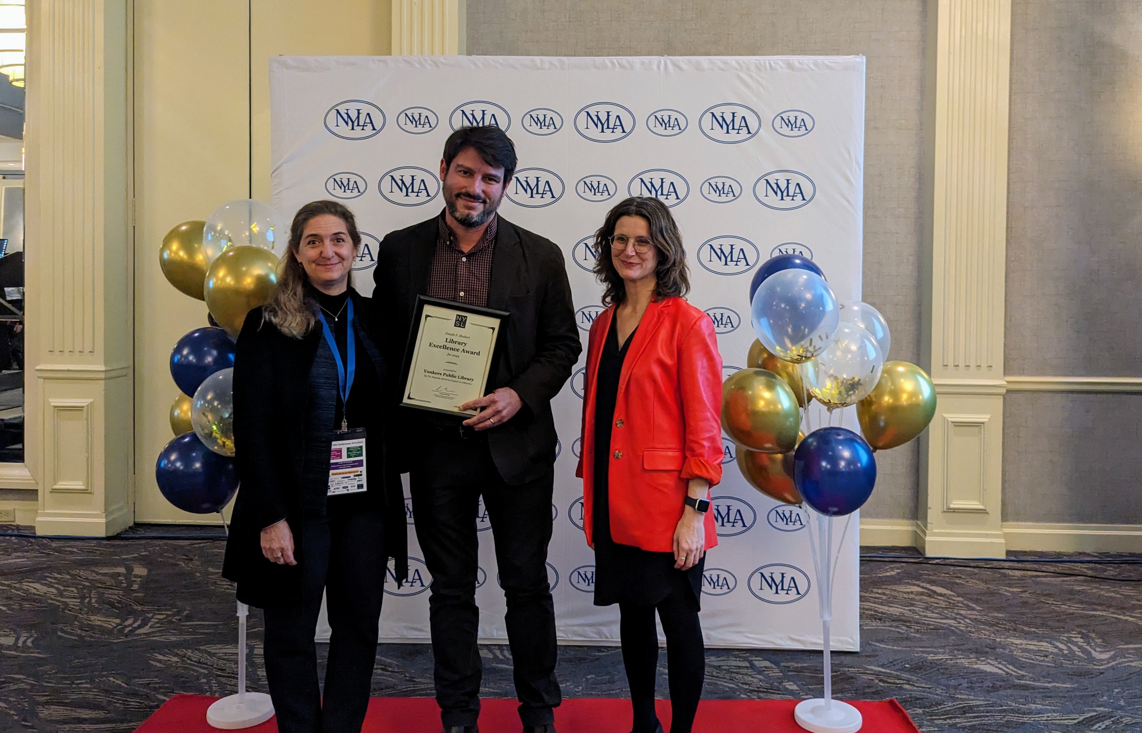 Jesse Montero and Nancy Maron receive Shubert Award from State Librarian Lauren Moore