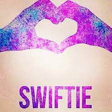 purple and blue hands in shape of heart with Swiftie written under