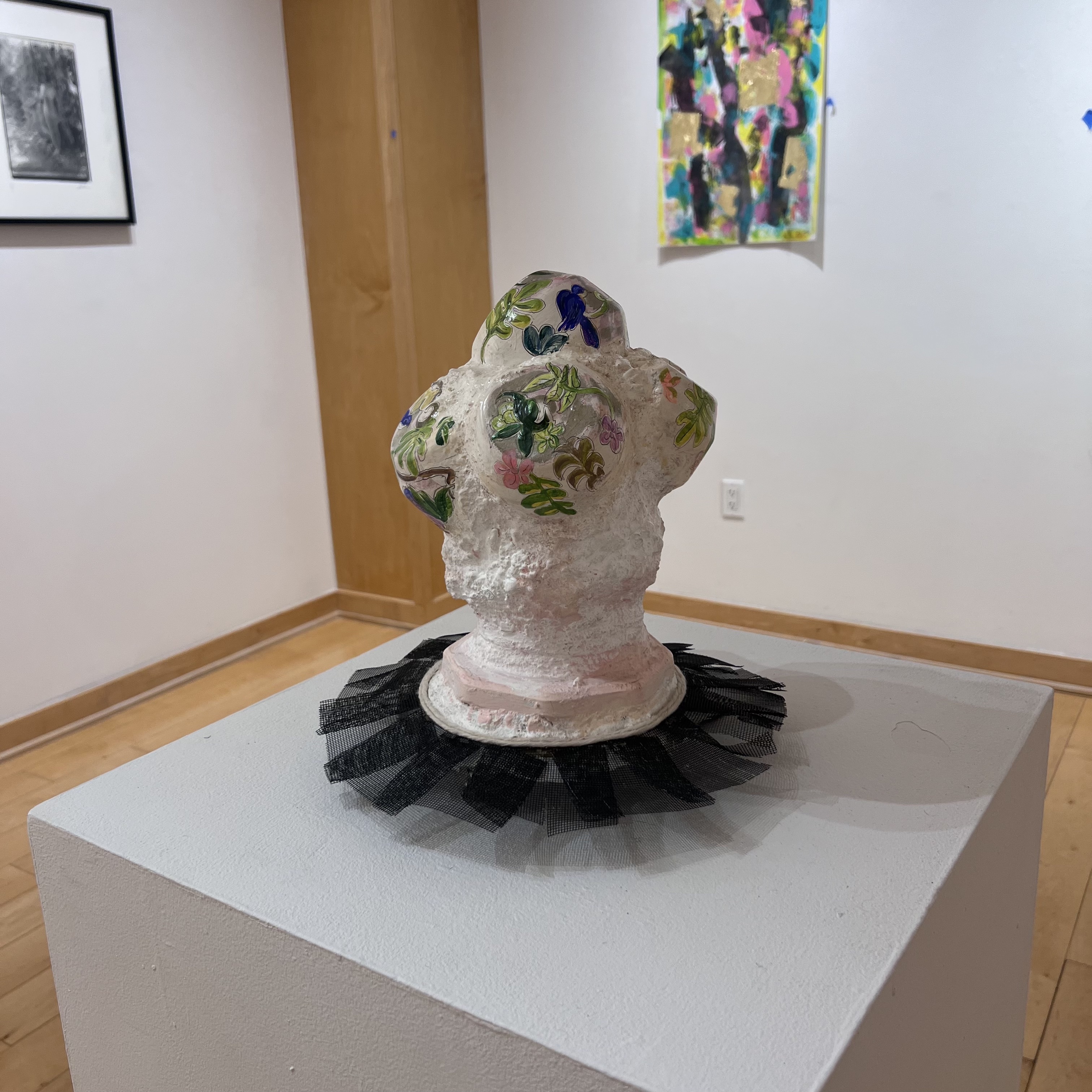 Cement sculpture mimicking a body in a tutu