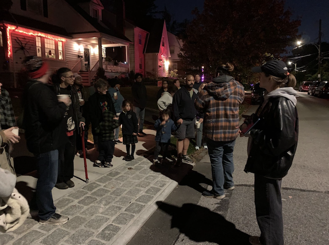 Patrons walking in Crestwood neighborhood for the Gotham Bat Conservancy bat walk.