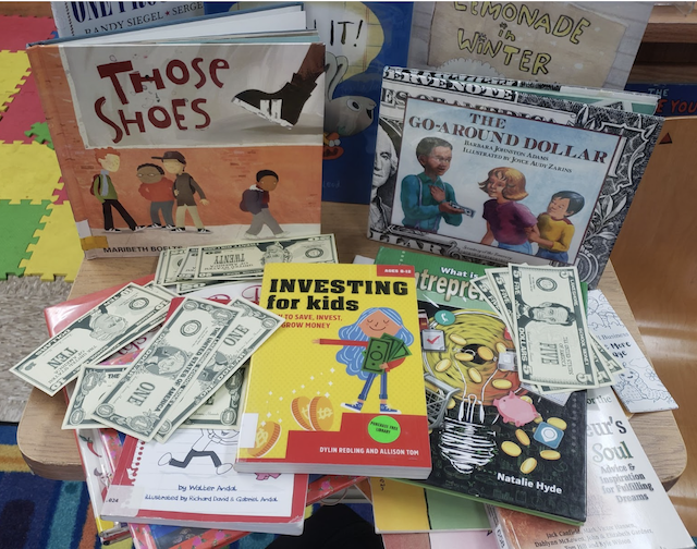 A display of financial literacy books.