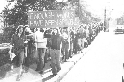 Student Protest: Sign reads "Enough Words Have Been Spoken"