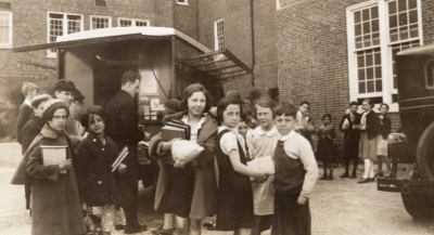 Children gathered around bookmobile