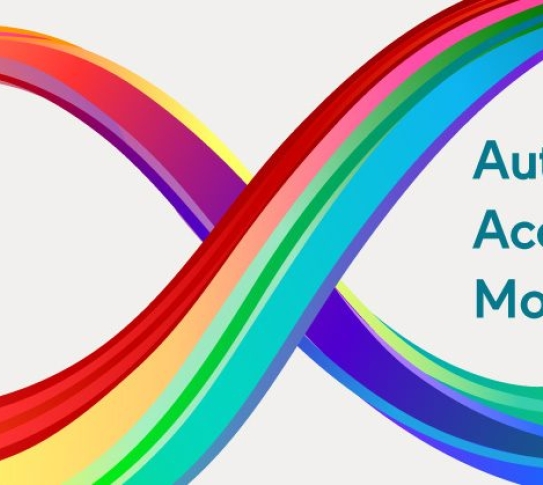A rainbow-colored infinity symbol on a beige background. Inside the right loop of the symbol are the words "Autism Acceptance Month."