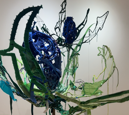 Installation of hand woven flowers