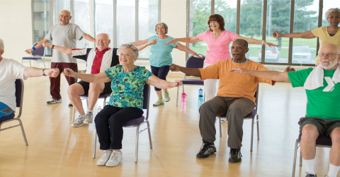 Seniors do chair yoga 
