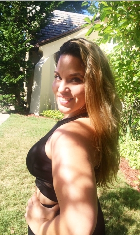 Image of Coach Karina in front of Crestwood Library