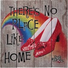 There's no place like home words with rainbow and ruby slippers
