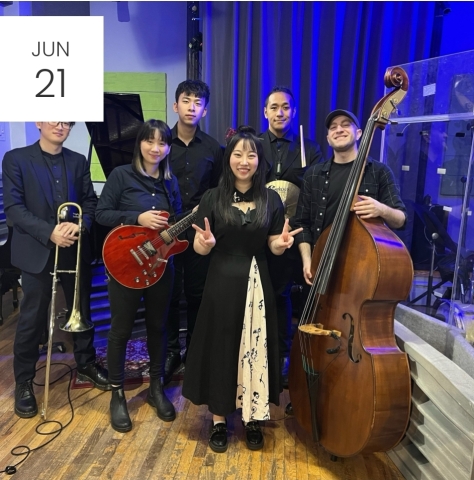 Photo of A Jazz ensemble - members with their instruments