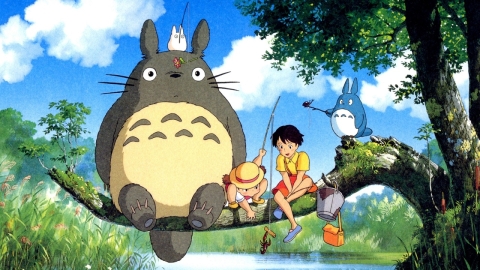 An image from Studio Ghibli's My Neighbor Totoro. Totoro sits on a branch above the water with two young girls and another small forest spirit. They are fishing.