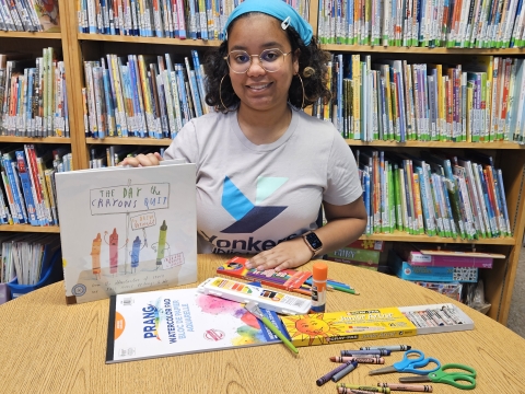 photo of artist Say Marte with Art Supplies