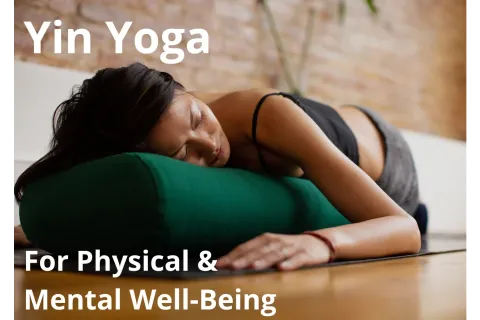 person lying on a bolster on floor with Yin Yor Physical & Mental Well Being words written out on the photo
