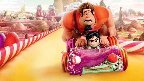 Horizontal promotional image for Wreck-It Ralph. Vanellope drives her racecar confidently on a candy track, with Ralph sitting nervously in the back seat.