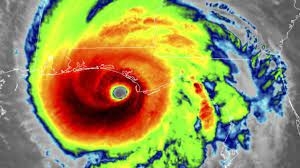 colorful weather map showing spiral of hurricane