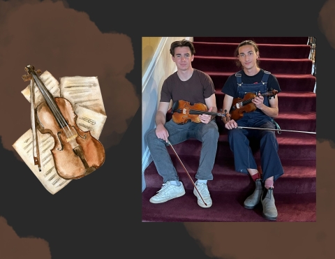 musician sitting on stairs holding violins