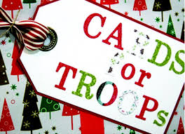 luggage tag with cards for troops written on it