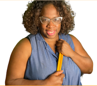 Woman named Tati Sabrina holding two drumsticks and smiling