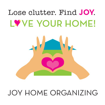 hands making a heart shape over a house with Lose clutter. Find Joy Love your HOME!