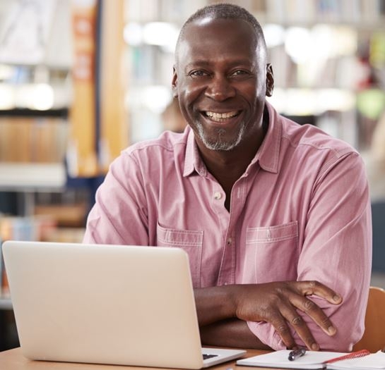 Man sitting at laptop