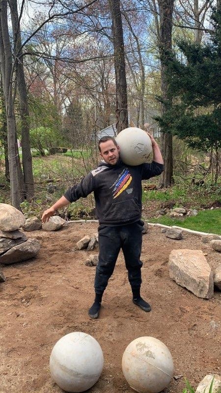 photo of coach mike holding a medicine ball