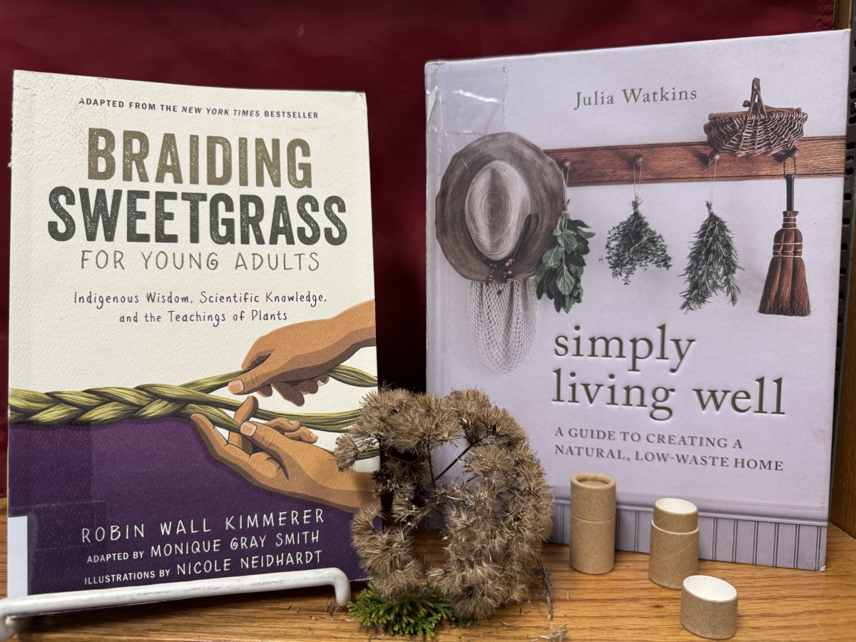 Image of environmental books and compostable lip balm tubes