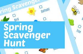 Spring Scavenger Hunt words written on a card with clues of nature objects to find