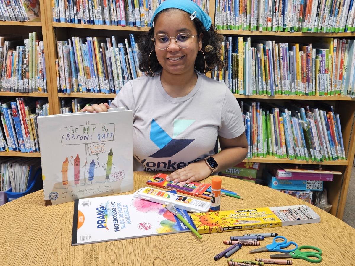 photo of artist Say Marte with Art Supplies