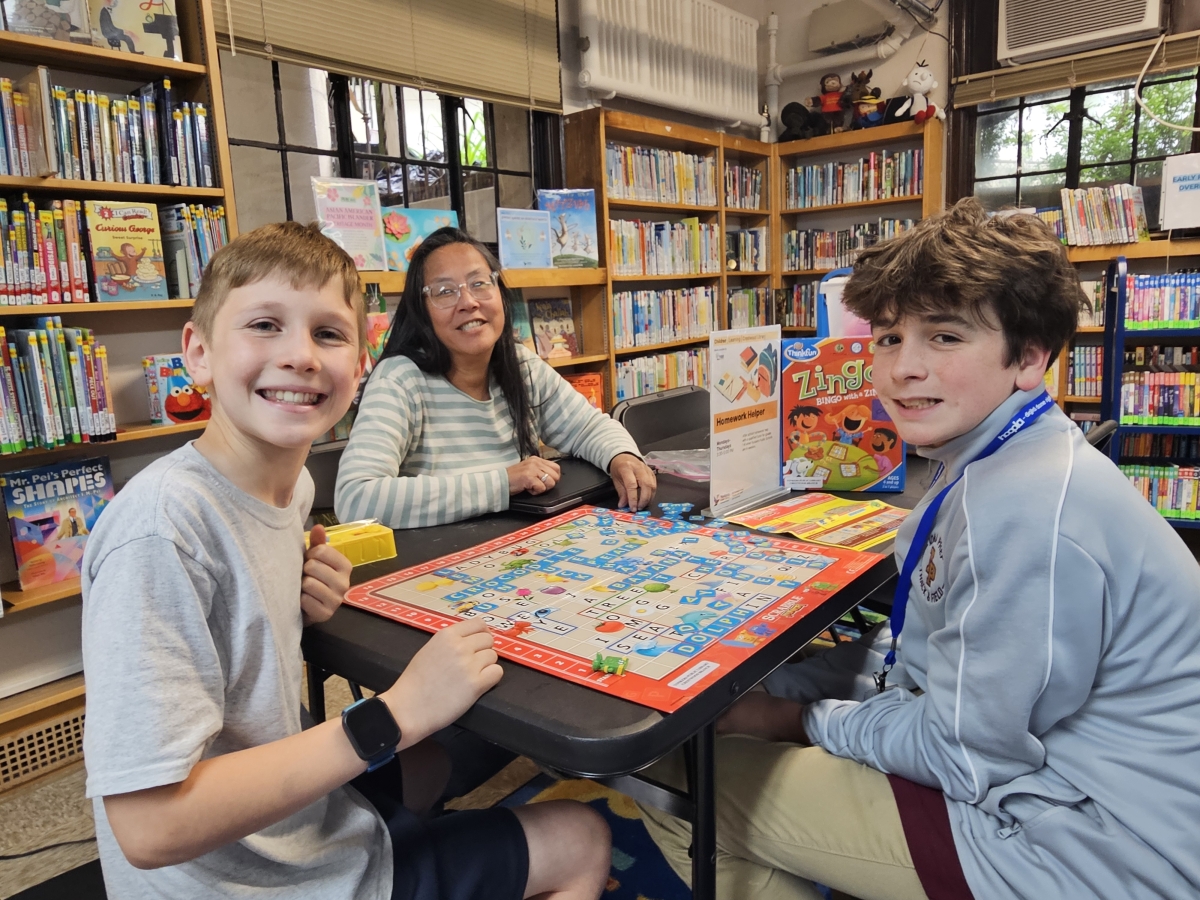 Ms. Sarah Homework Helper at Crestwood Playing Word games with children