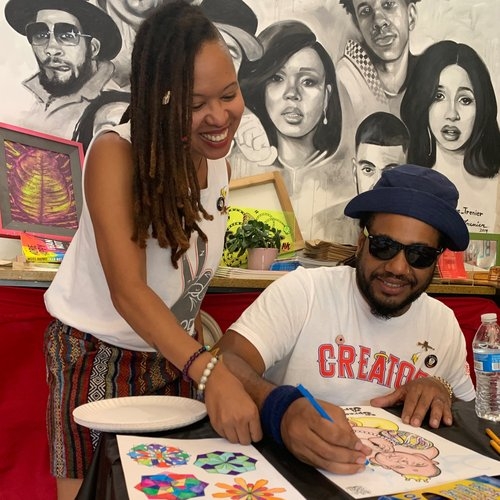 Photo of husband and wife team Noble Alkhemy drawing 