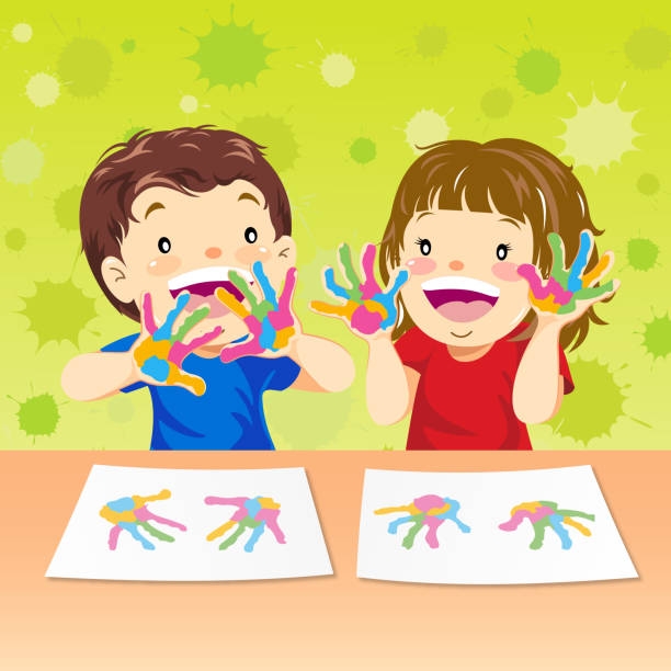 image of boy and girl with paint on their hands making pictures